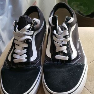 Black and white Vans sneakers